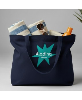 Bolsa de playa solidaria azul marino con fondo plano y asas de algodón colección Verano 2026